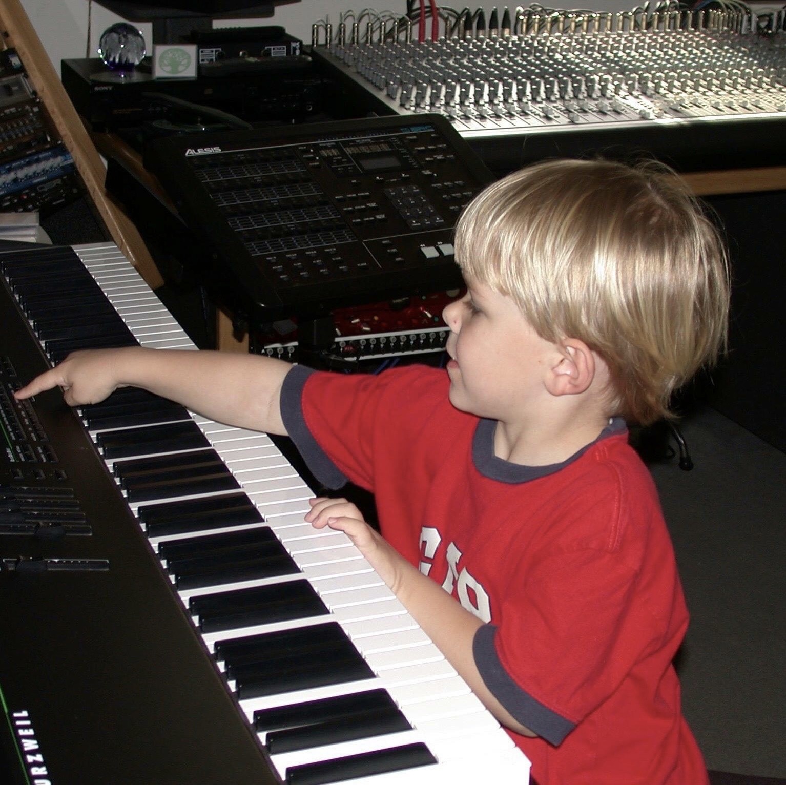 Cameron DeFaria as a child in the studio